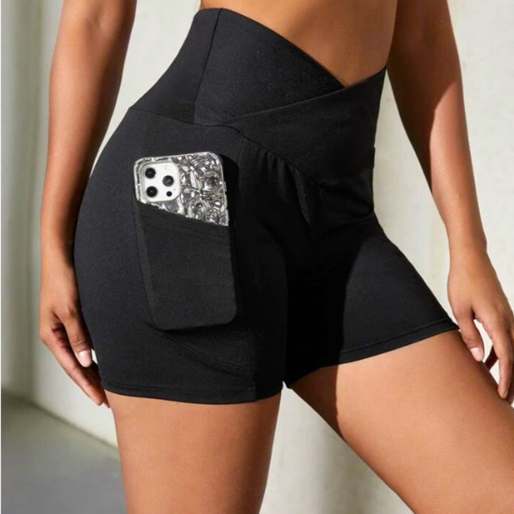The shorts have a v-line around the waist & come with pockets on each side.